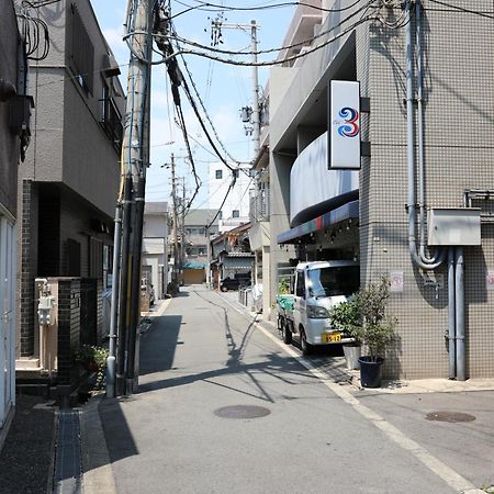 Guesthouse Yours Ōsaka Extérieur photo